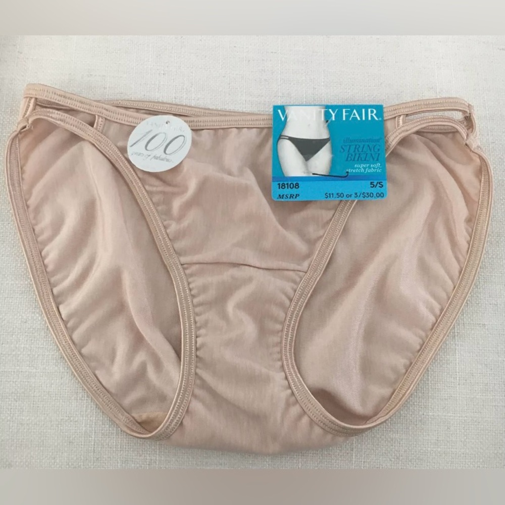 Vanity Fair Illumination String Bikini Panty Size 5.. New with tags.